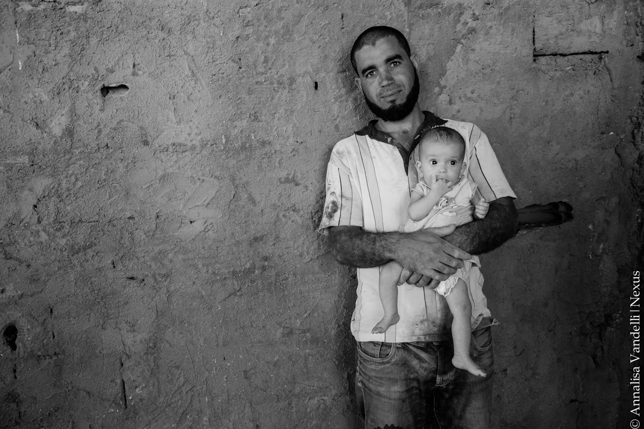 A refugee father with his child